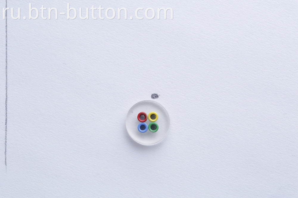 Four-hole color transparent button